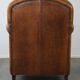 Charmant et robuste fauteuil en cuir de mouton, grand modèle