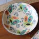 Glazed earthenware dish – polychrome floral decoration