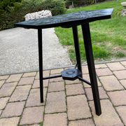Hand painted black hexagon shaped occasional table.