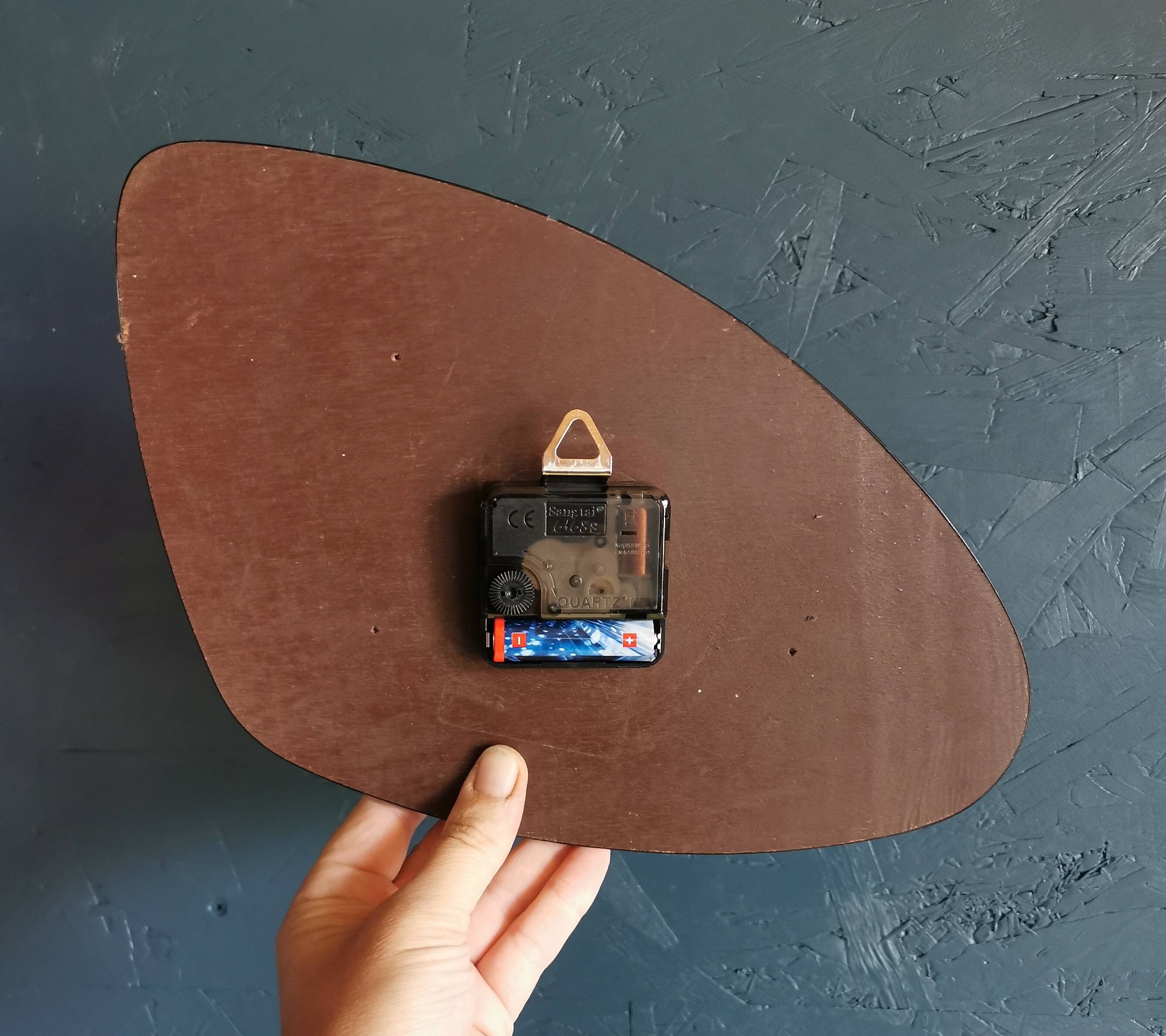 Vintage formica clock silent asymmetrical wall pendulum "Round golden green"