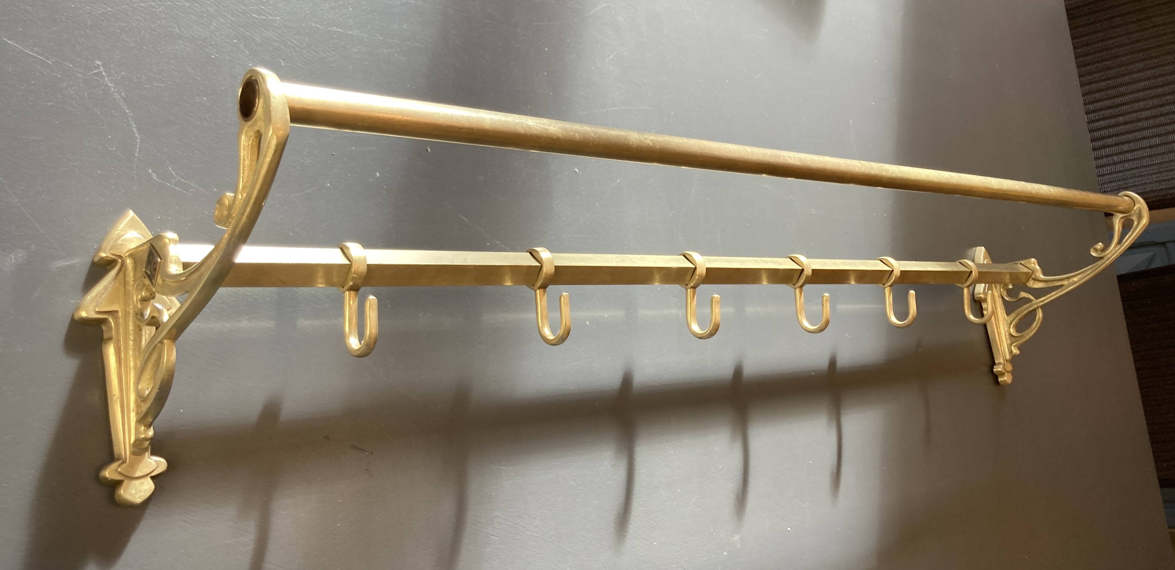 Art-deco wall-mounted coat rack in brass