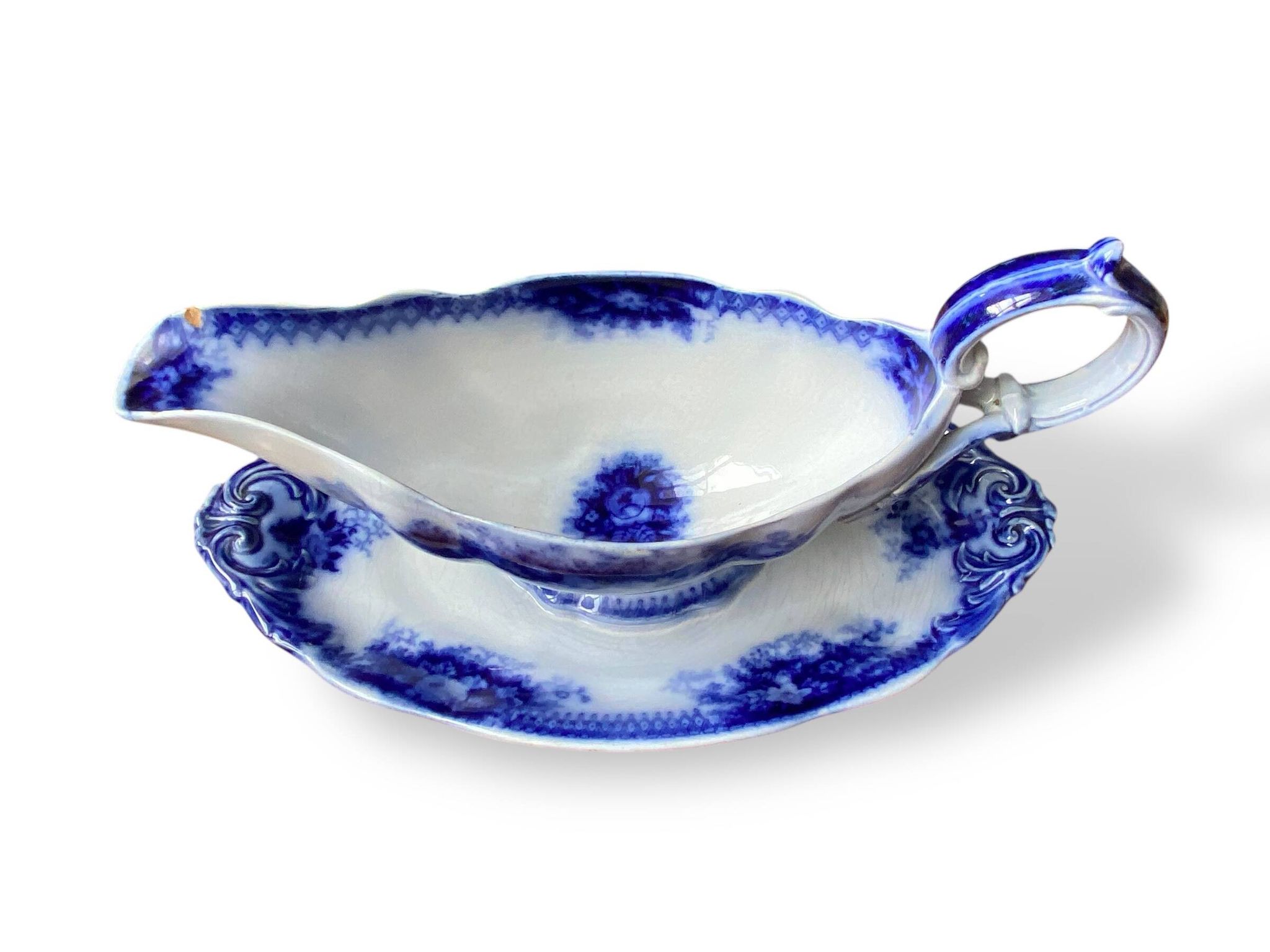 Large antique gravy boat on a Sarreguemines U&C earthenware tray