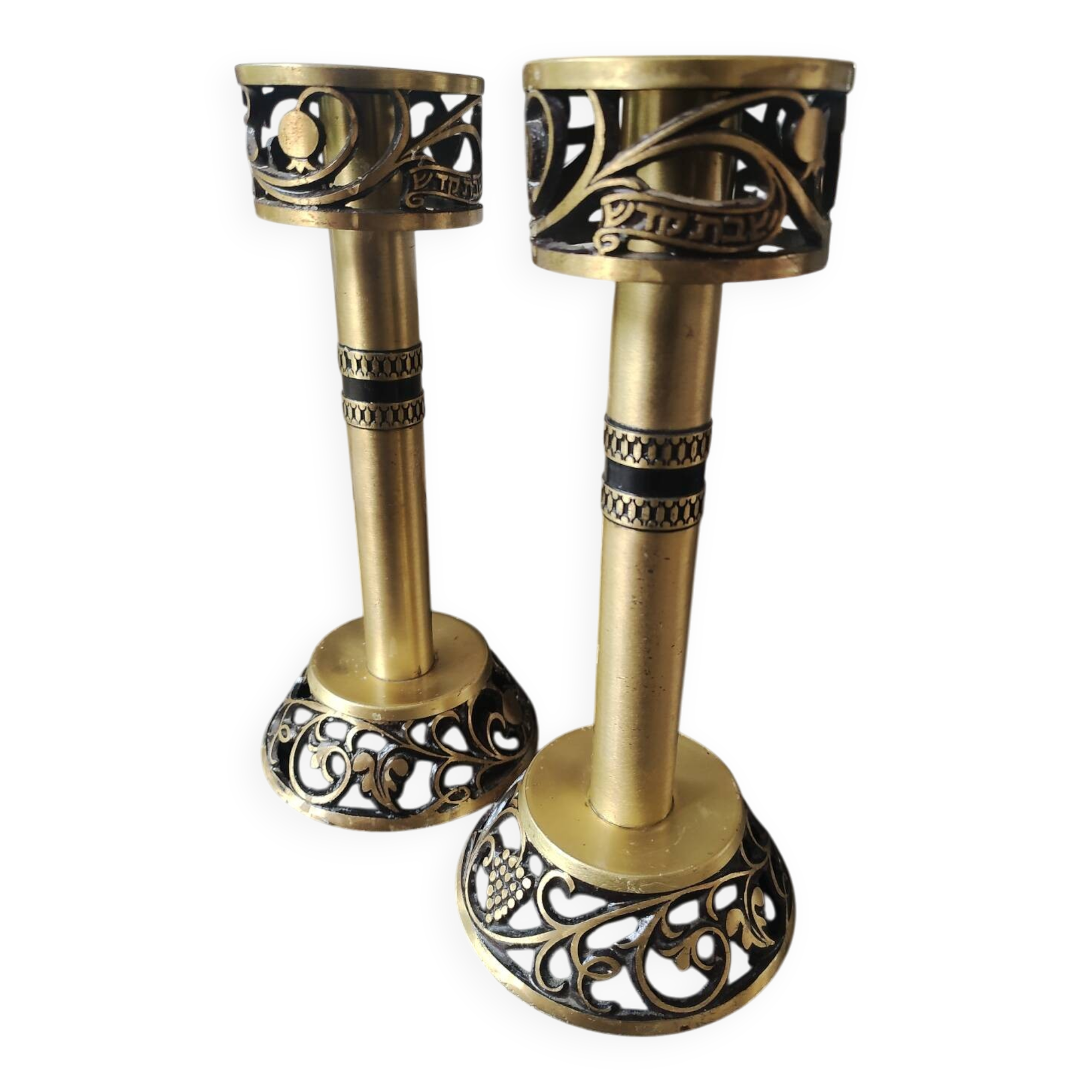 Pair of Hebrew Candlesticks. In antique gold-plated brass. Signed FFS Israel