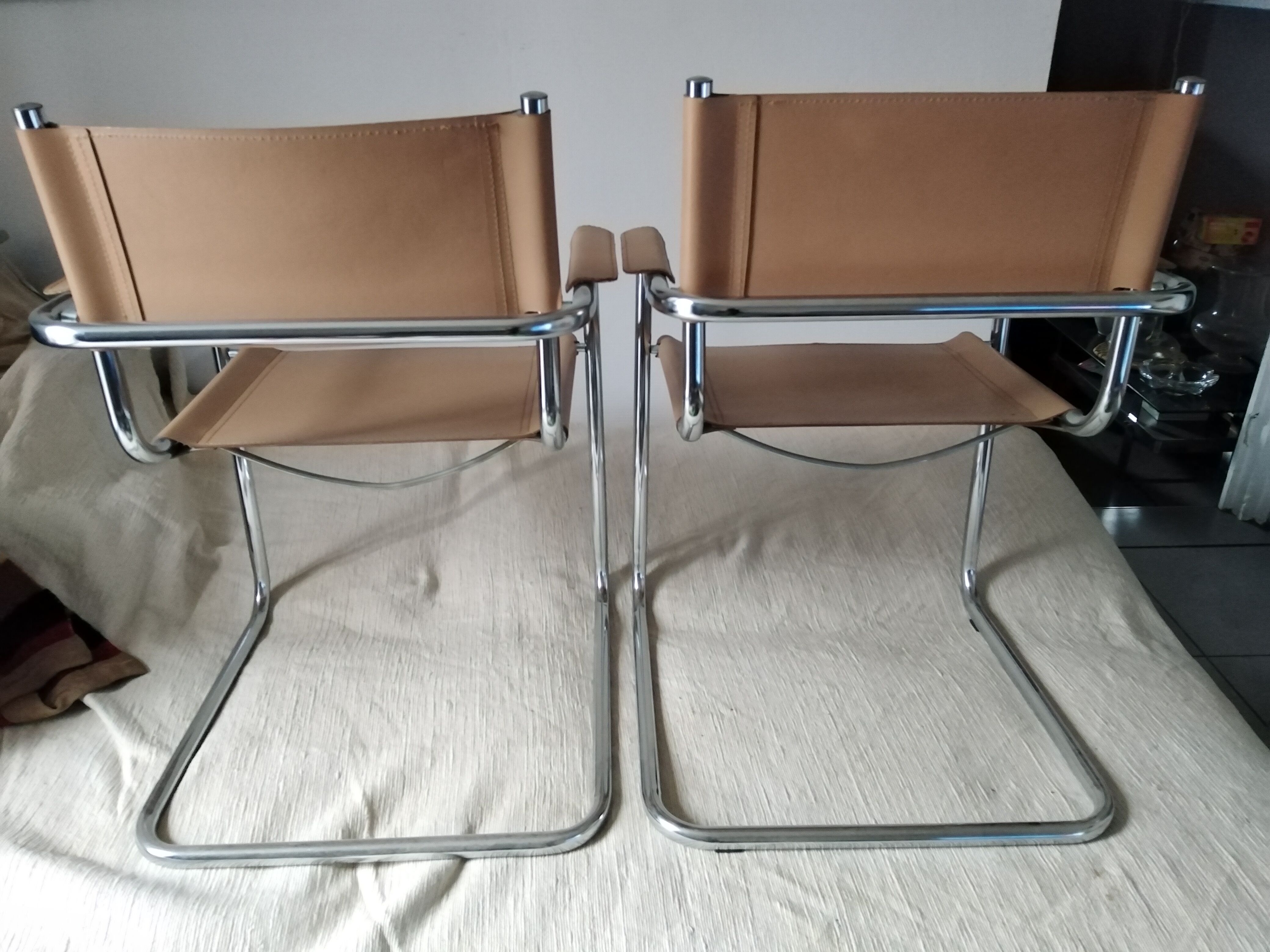 Pair of leather and chrome armchairs