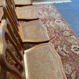 Suite de 8 chaises en cannage de style Louis XV