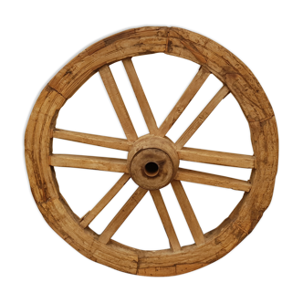 Old teak plow wheel
