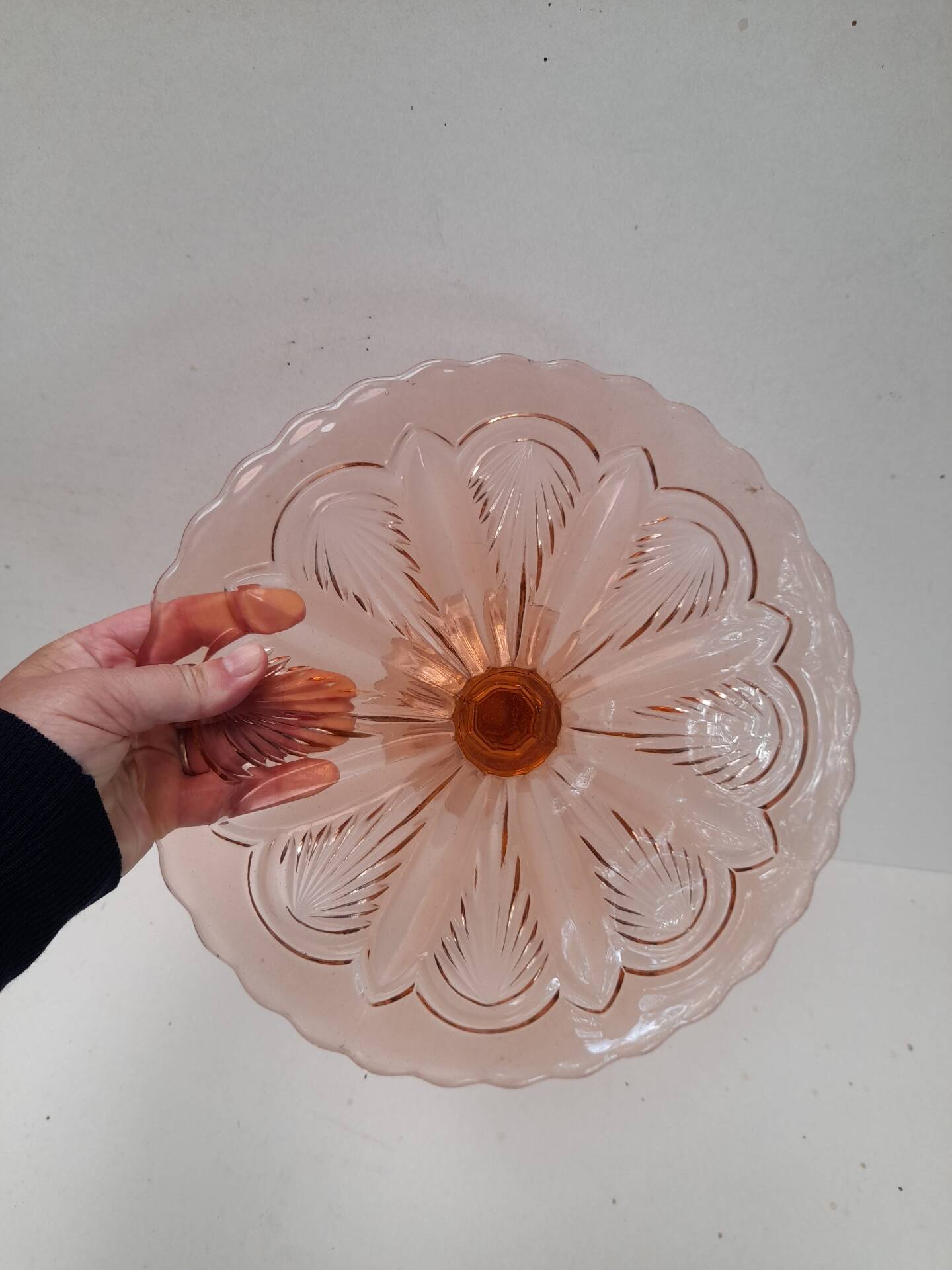 Pink pressed glass cake stand