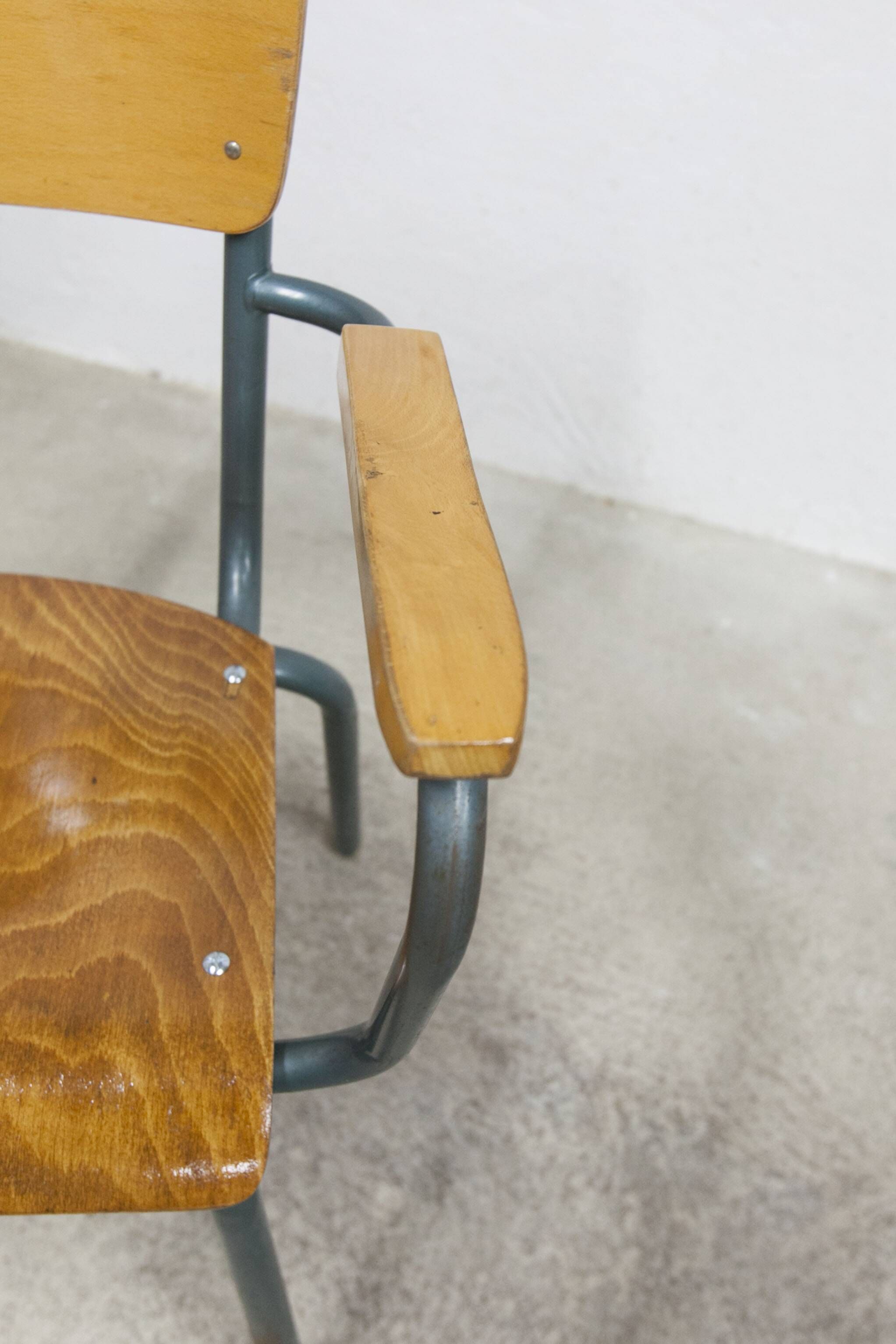 1962 school teacher's chair in honey color and tubular structure