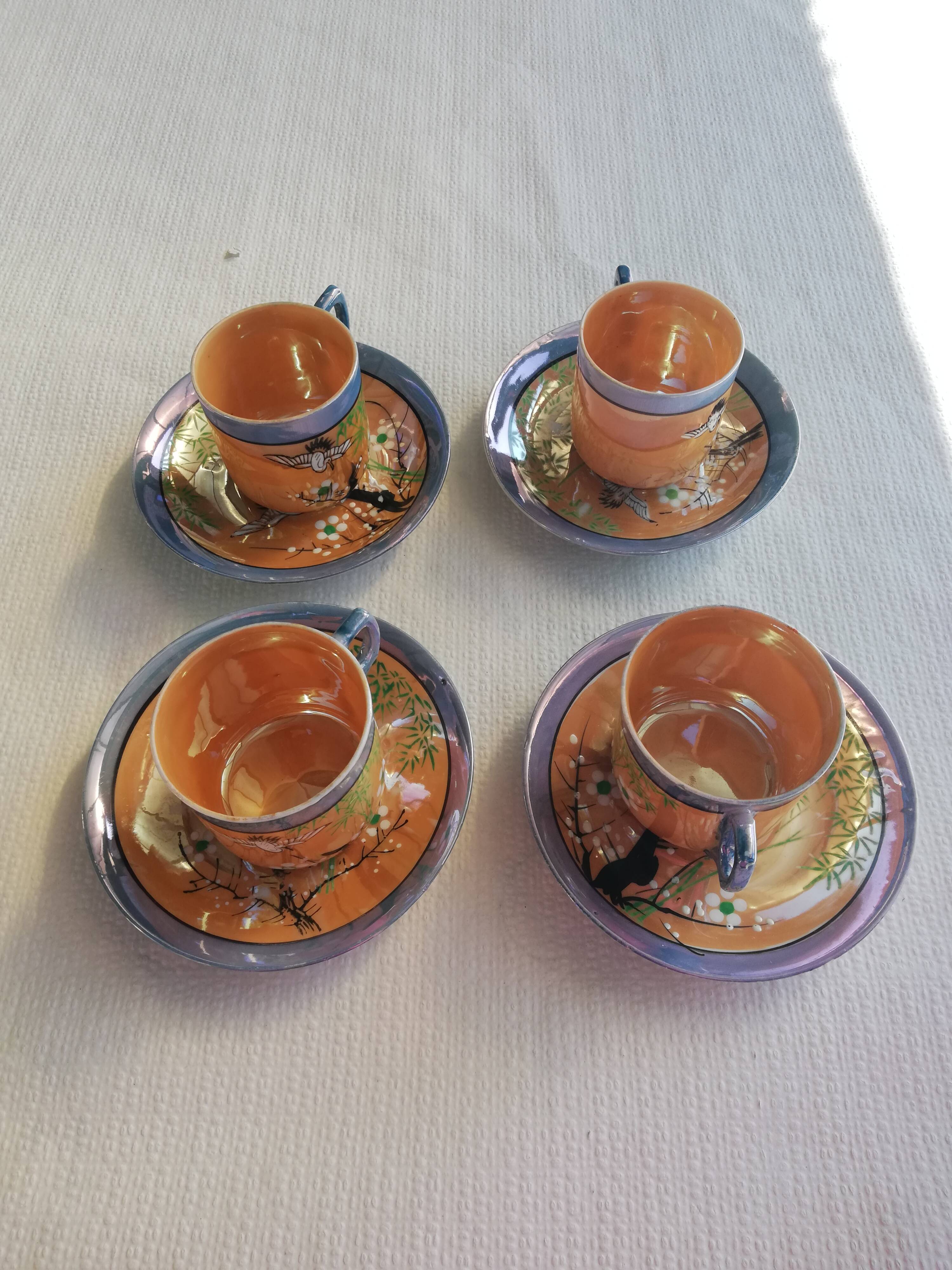 Fine porcelain cups with Japanese decor