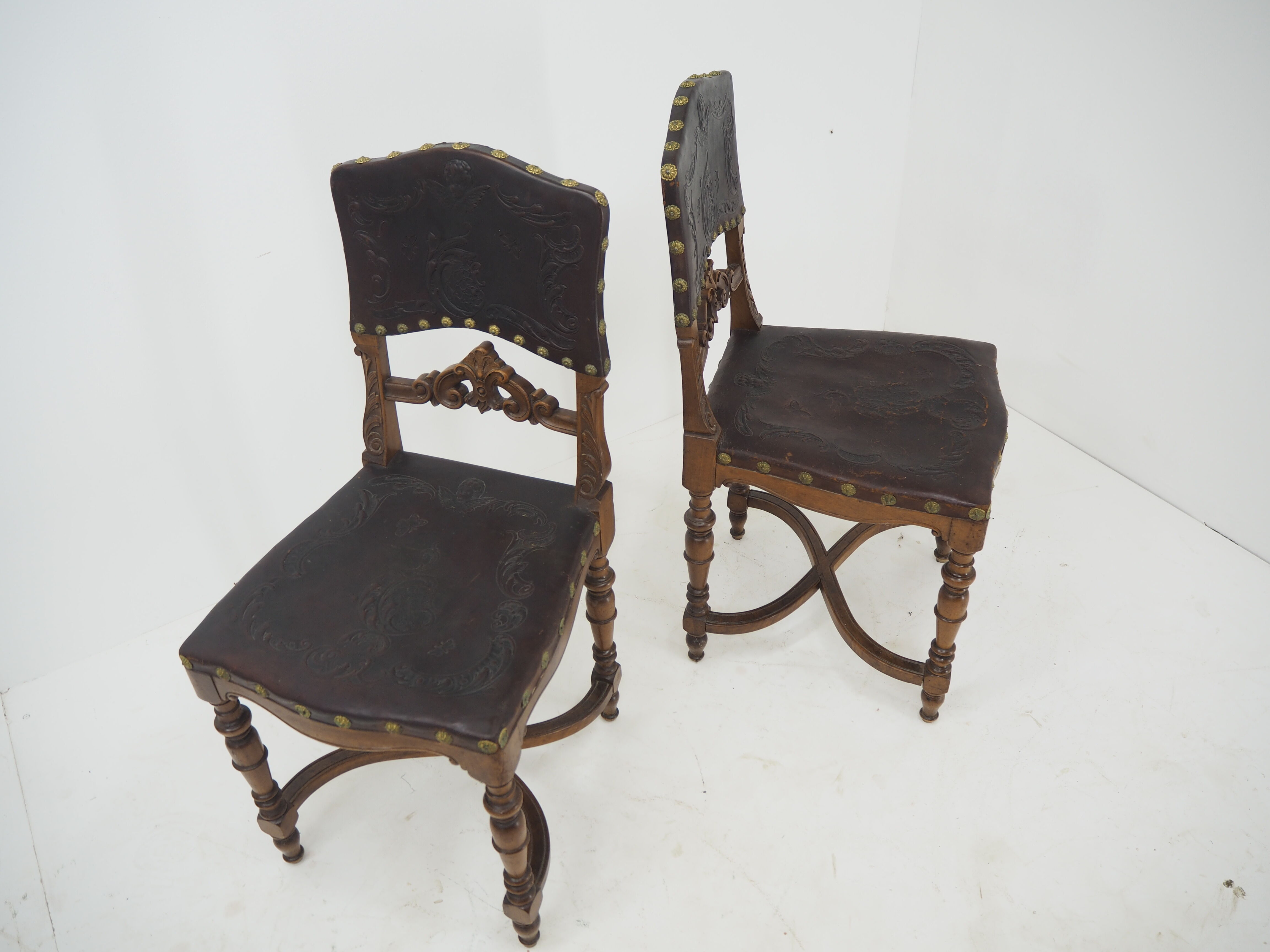 Pair of Antique Embossed Leather Chairs