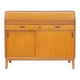 Modern Scandinavian wardrobe in teak with sliding doors and drop-down flap.