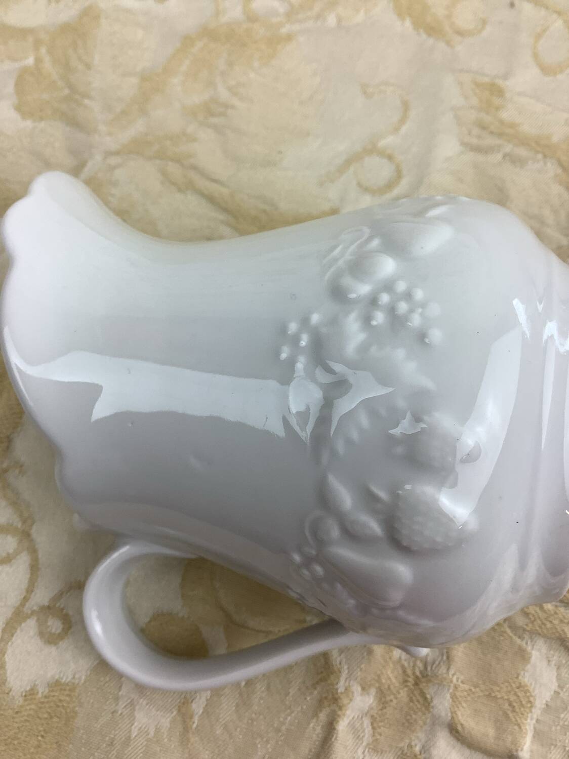 Small white porcelain milk jug