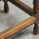 Solid oak stool, straw and brass from the 1920s.