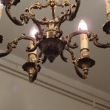 Chandelier in gilded with six arms chiseled bronze.