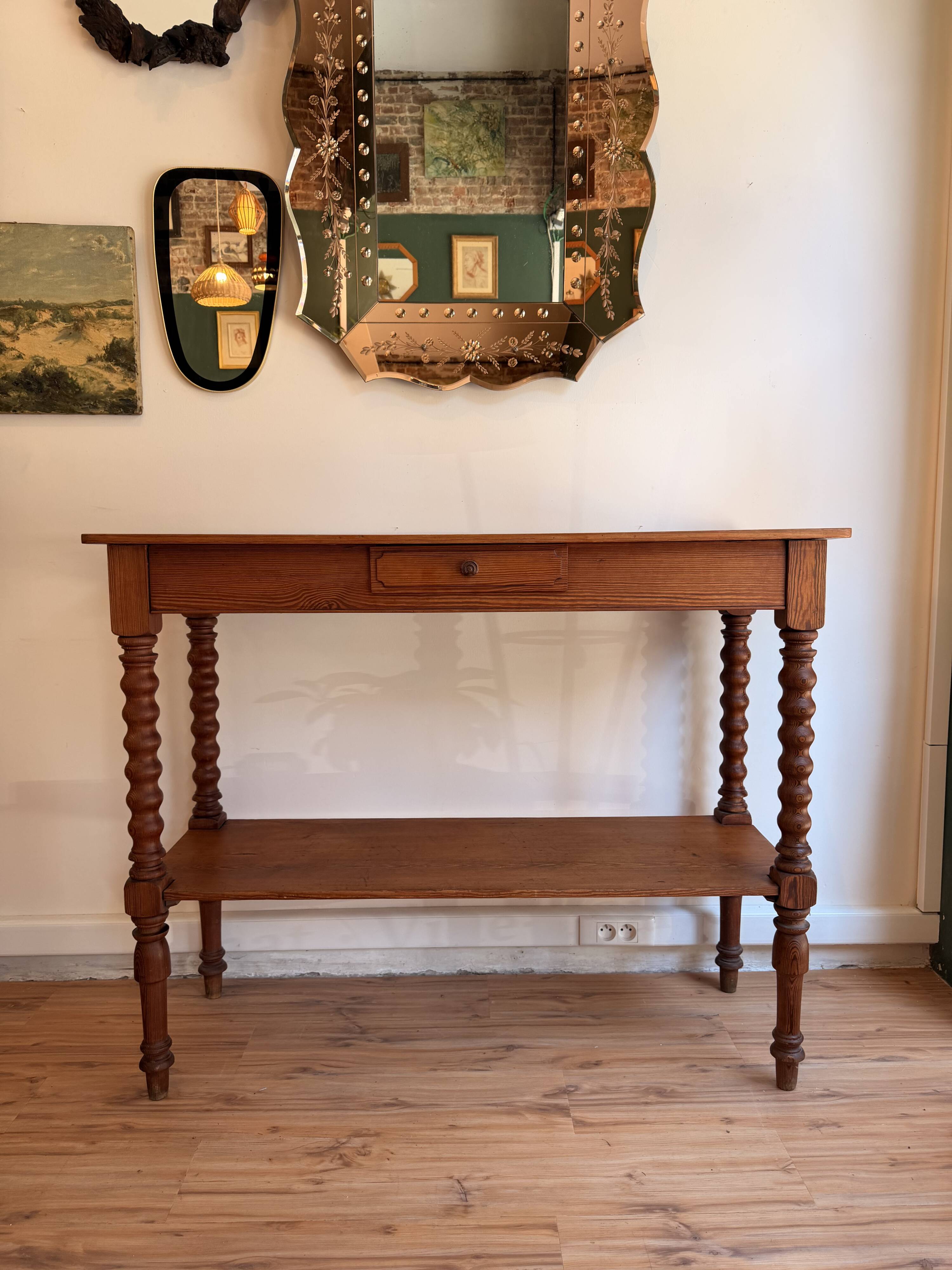Large console or shop sideboard in pitch pine, early 20th century.