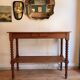 Large console or shop sideboard in pitch pine, early 20th century.
