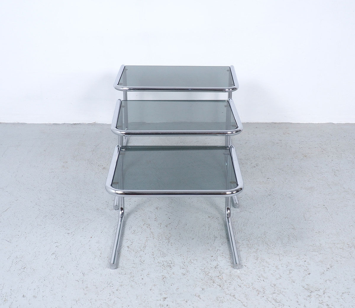 Vintage chromed nesting tables with smoked glass