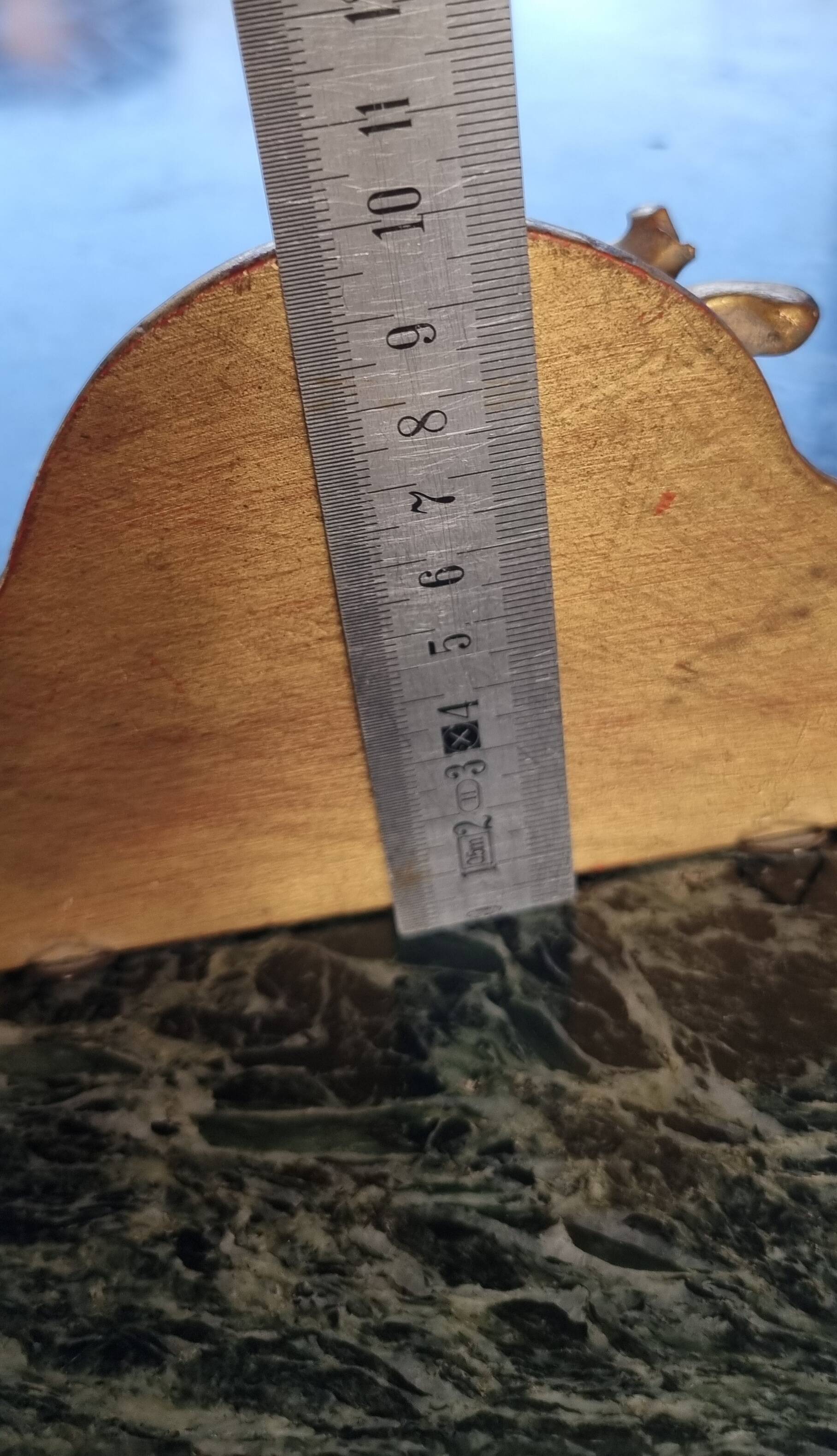 Golden wall shelf in Rococo style from the 1950s.