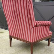 Old armchair and its Louis XVI style footrest/velvet covering