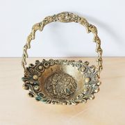 Empty bronze basket pocket with gallant stage décor