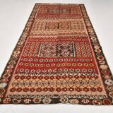 Kilim anatolien ancien tons rouges et beiges, motifs tribaux colorés