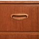 Scandinavian Chest of Drawers in teak with turned birch legs, 1950s