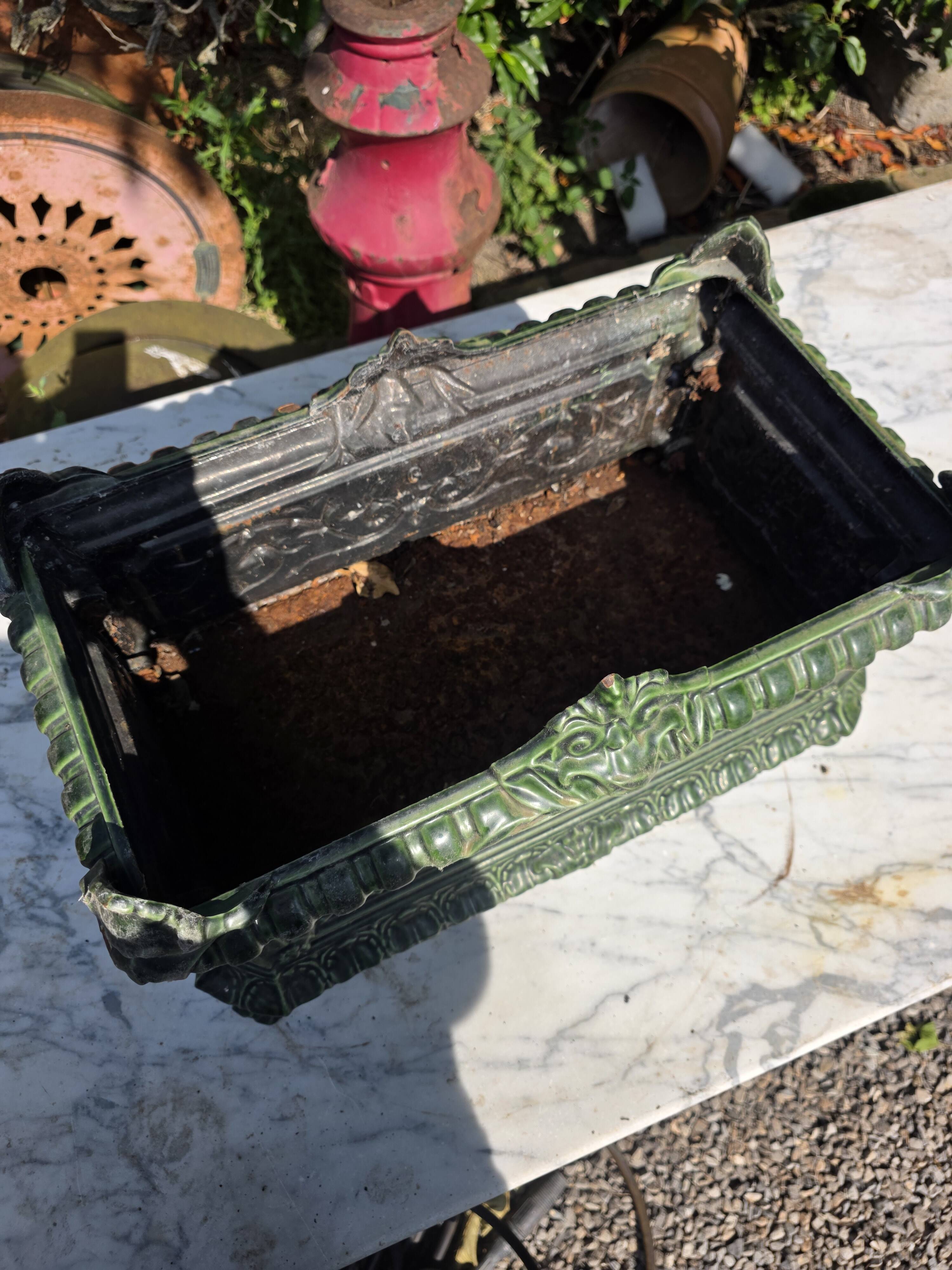 Antique enamelled cast iron planter in the Napoleon III style.
