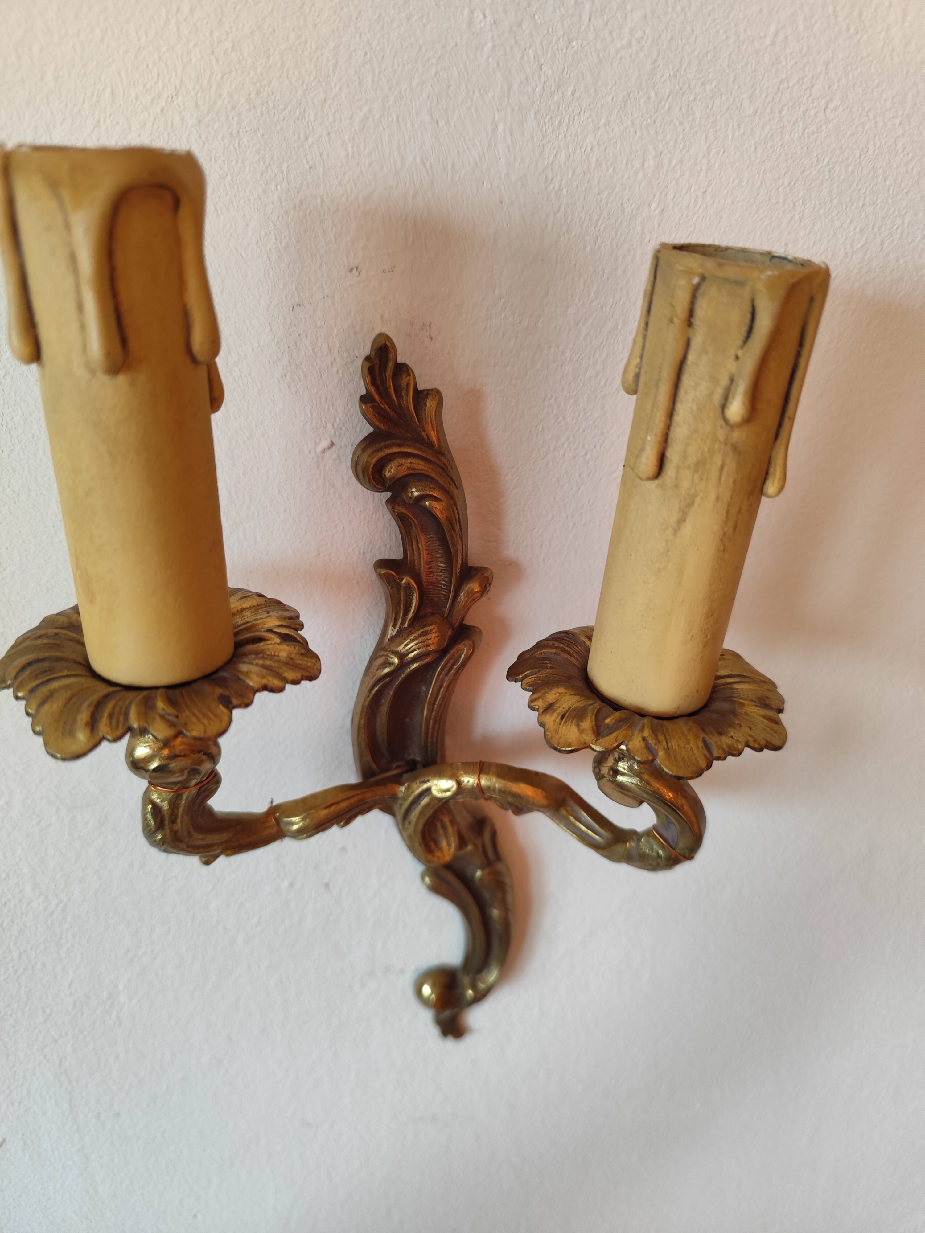 Pair of 19th century Louis XV style gilt bronze wall lights with 2 branches