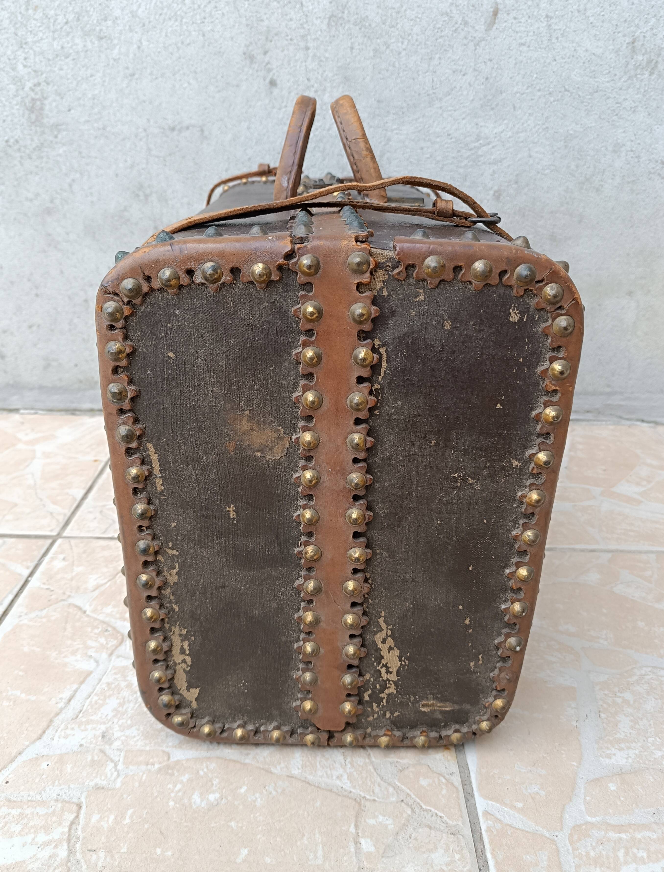 Antique wooden and leather travel trunk