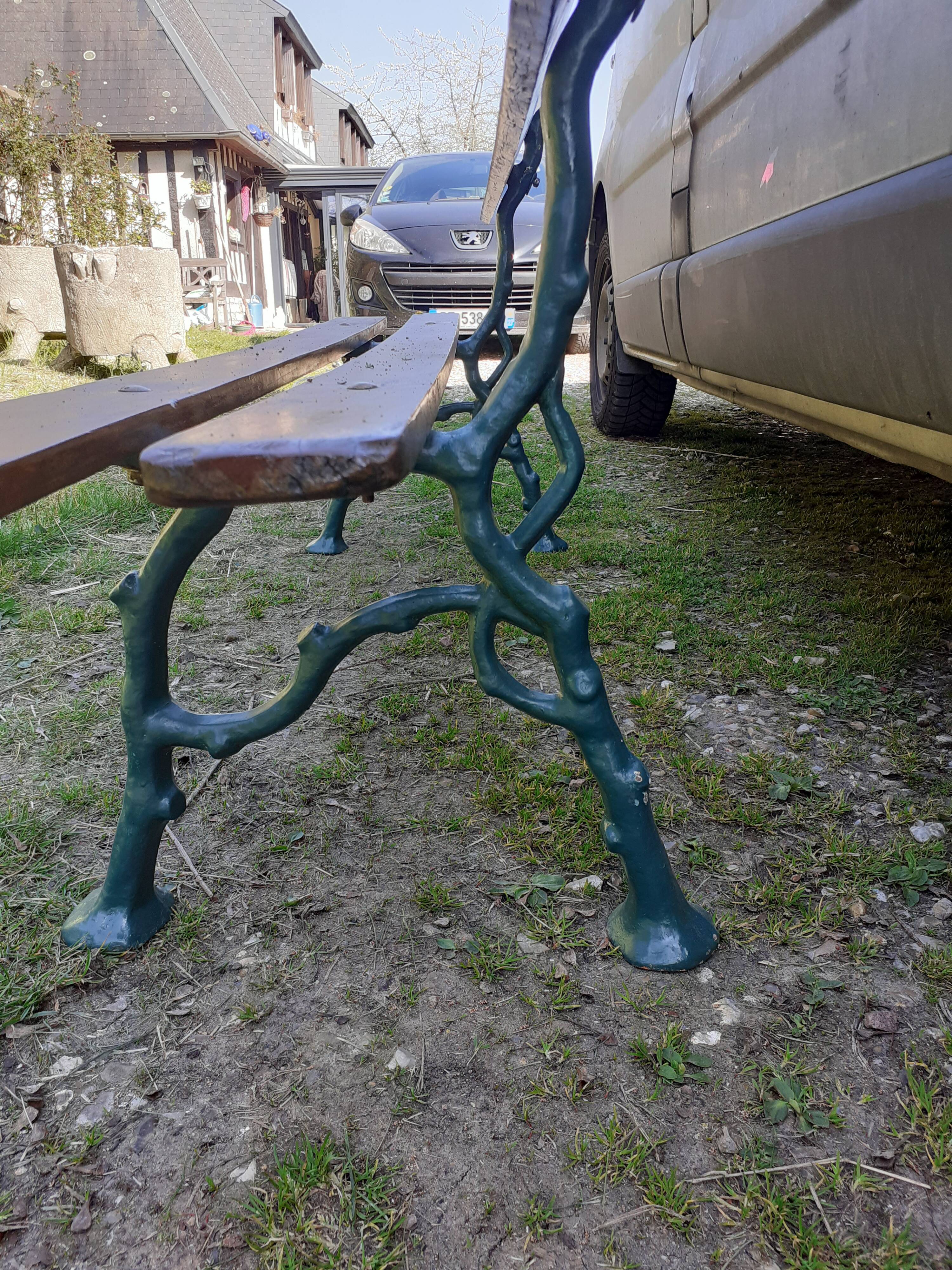 Old garden bench with cast iron feet