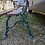 Old garden bench with cast iron feet