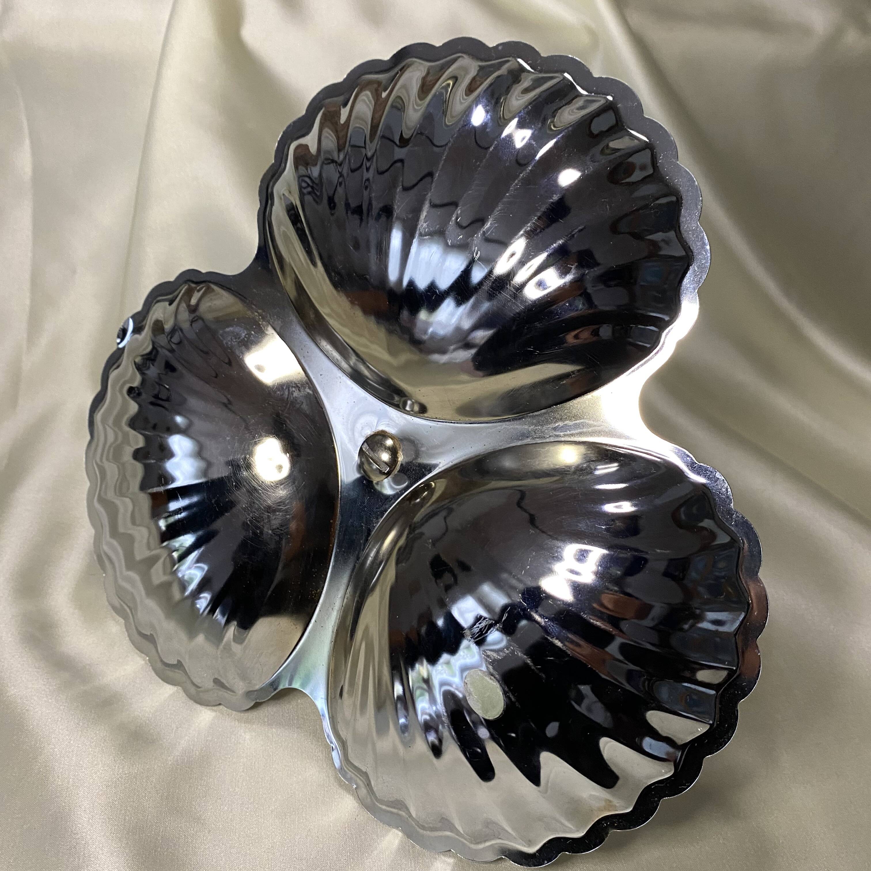 Stainless steel serving platter in the shape of seashells