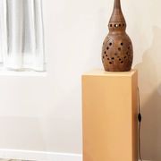 Terracotta lamp with cut-outs, circa 1970.