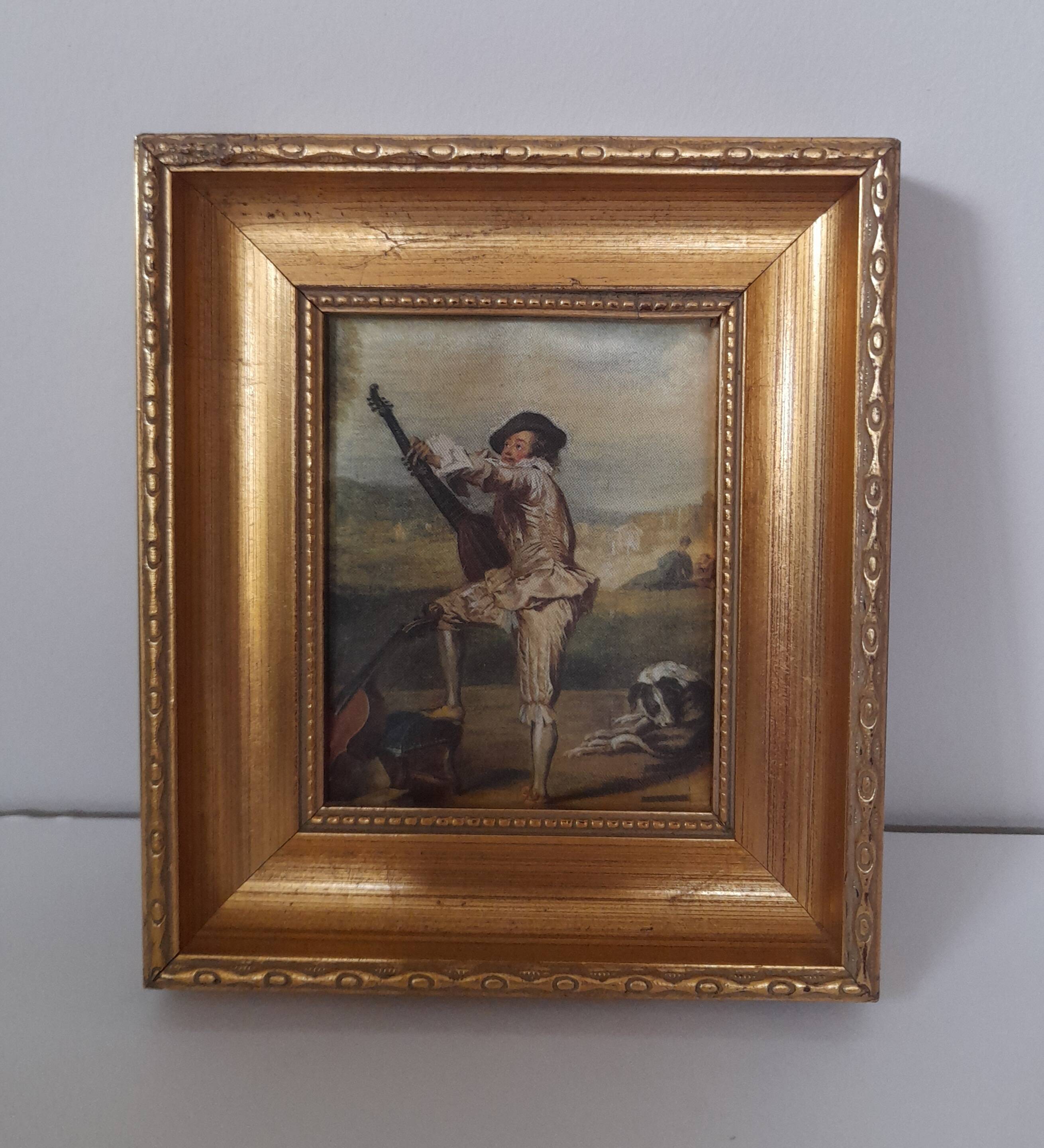 Old golden frame "lute player" on silk