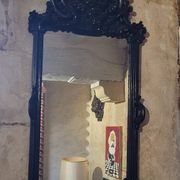 Mirror with carved wooden pediment, late 19th century