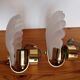 Pair of Deknudt shell wall lights