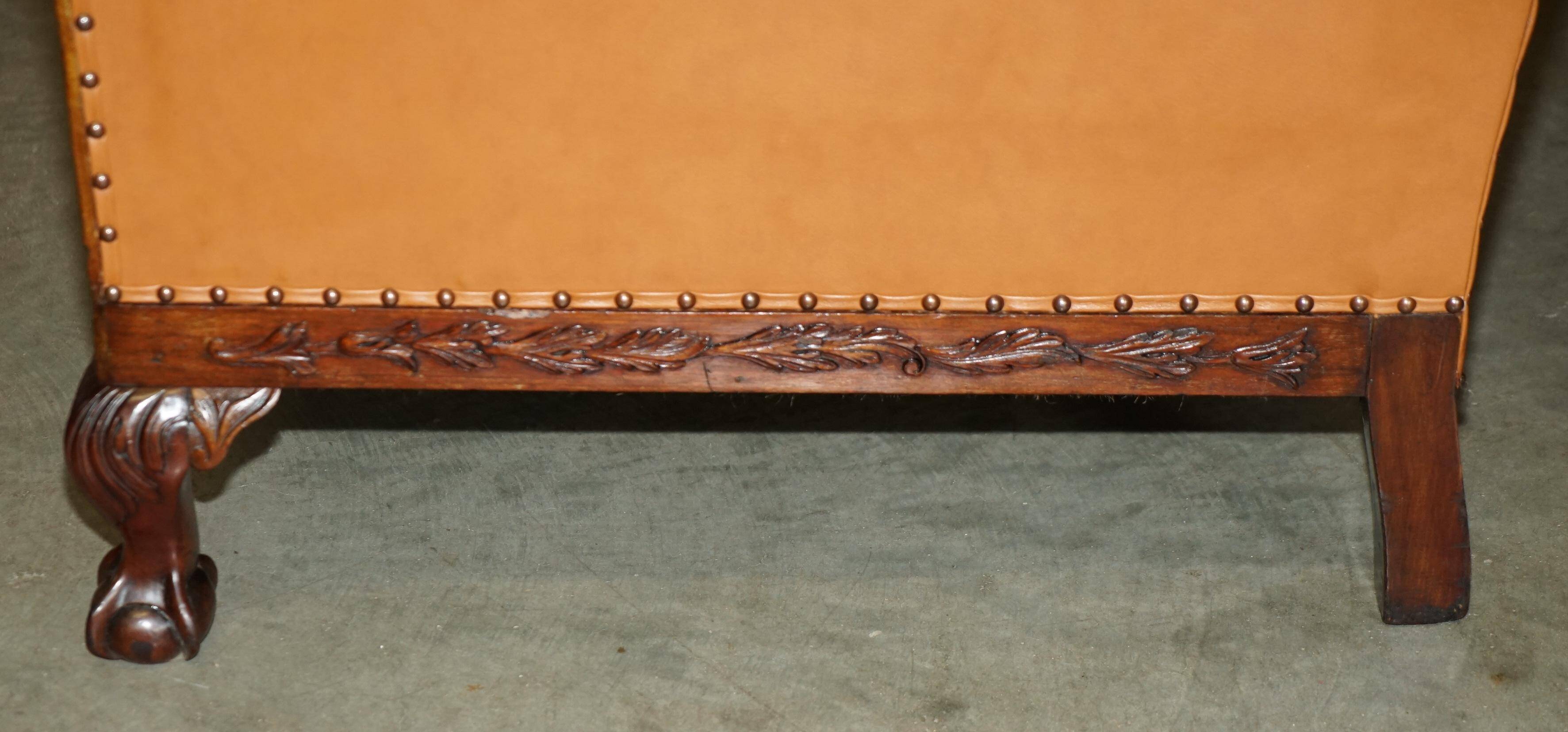 Restored three-seater leather canapé in late Victorian style.