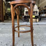 Canned bar stool and curved wood