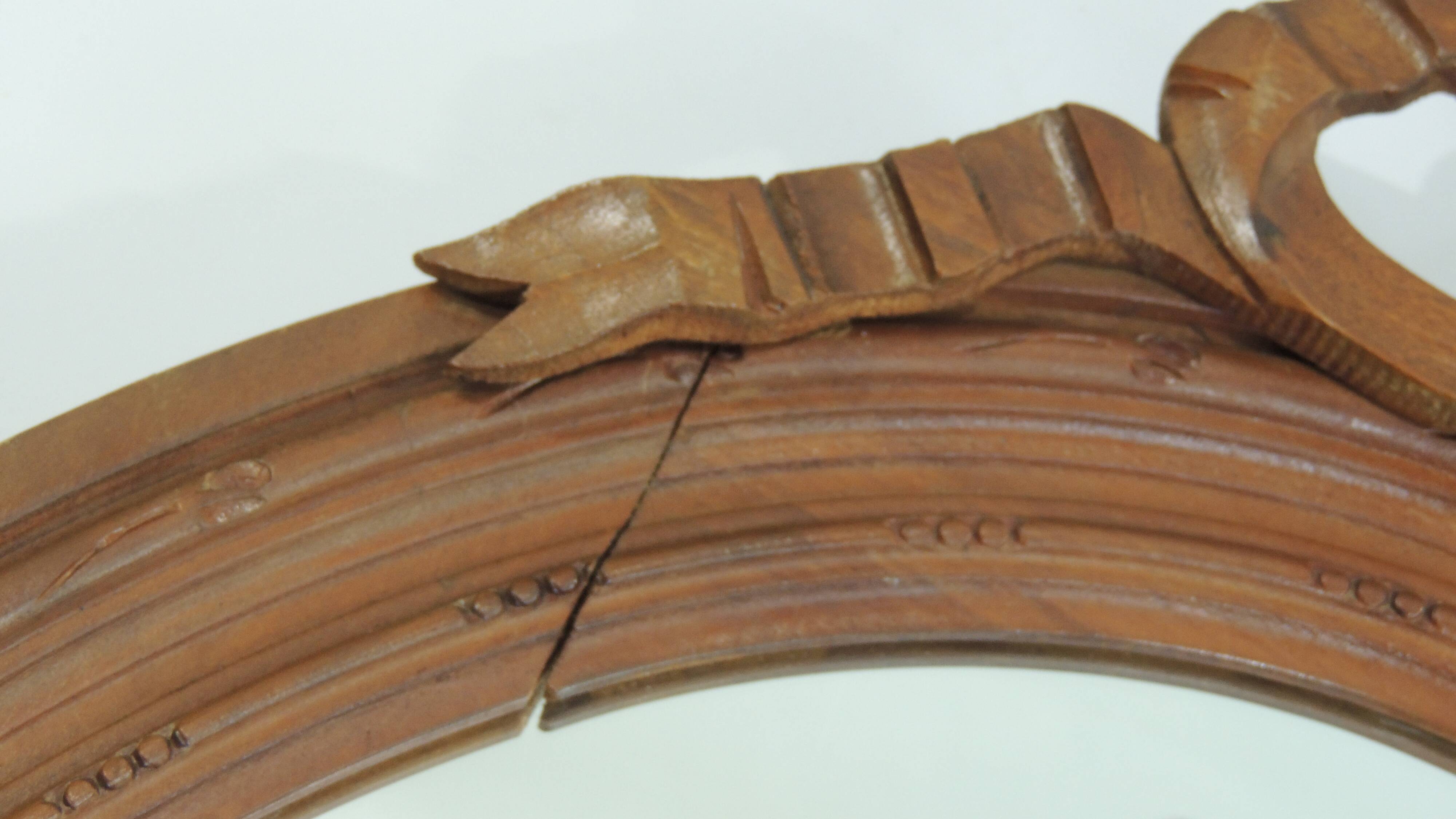 Antique oval mirror in carved wood – Louis XVI style, ribbon bow decoration, mid