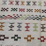 White carpet with multicolored Berber patterns handmade