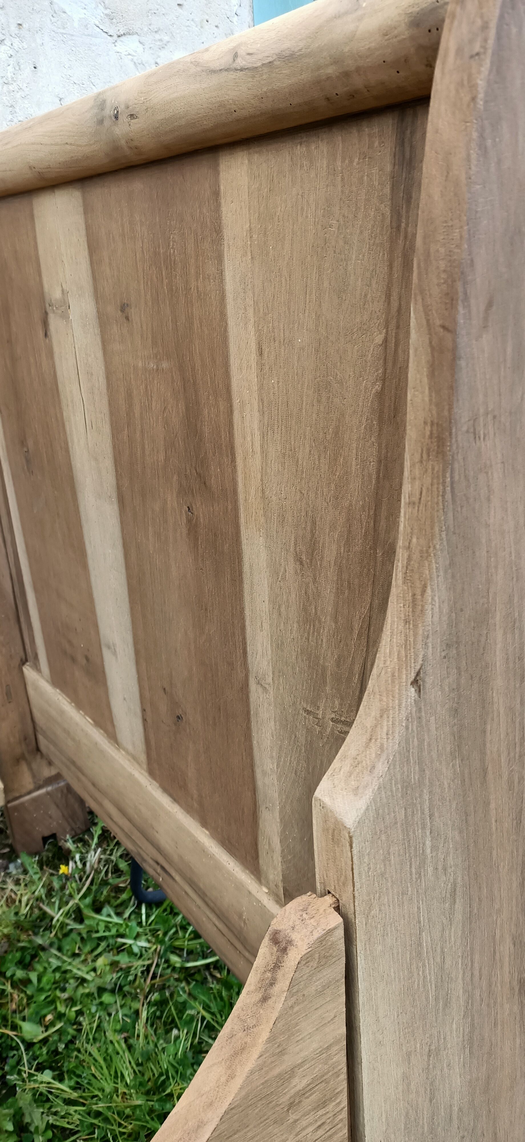 Old bed made of raw wood