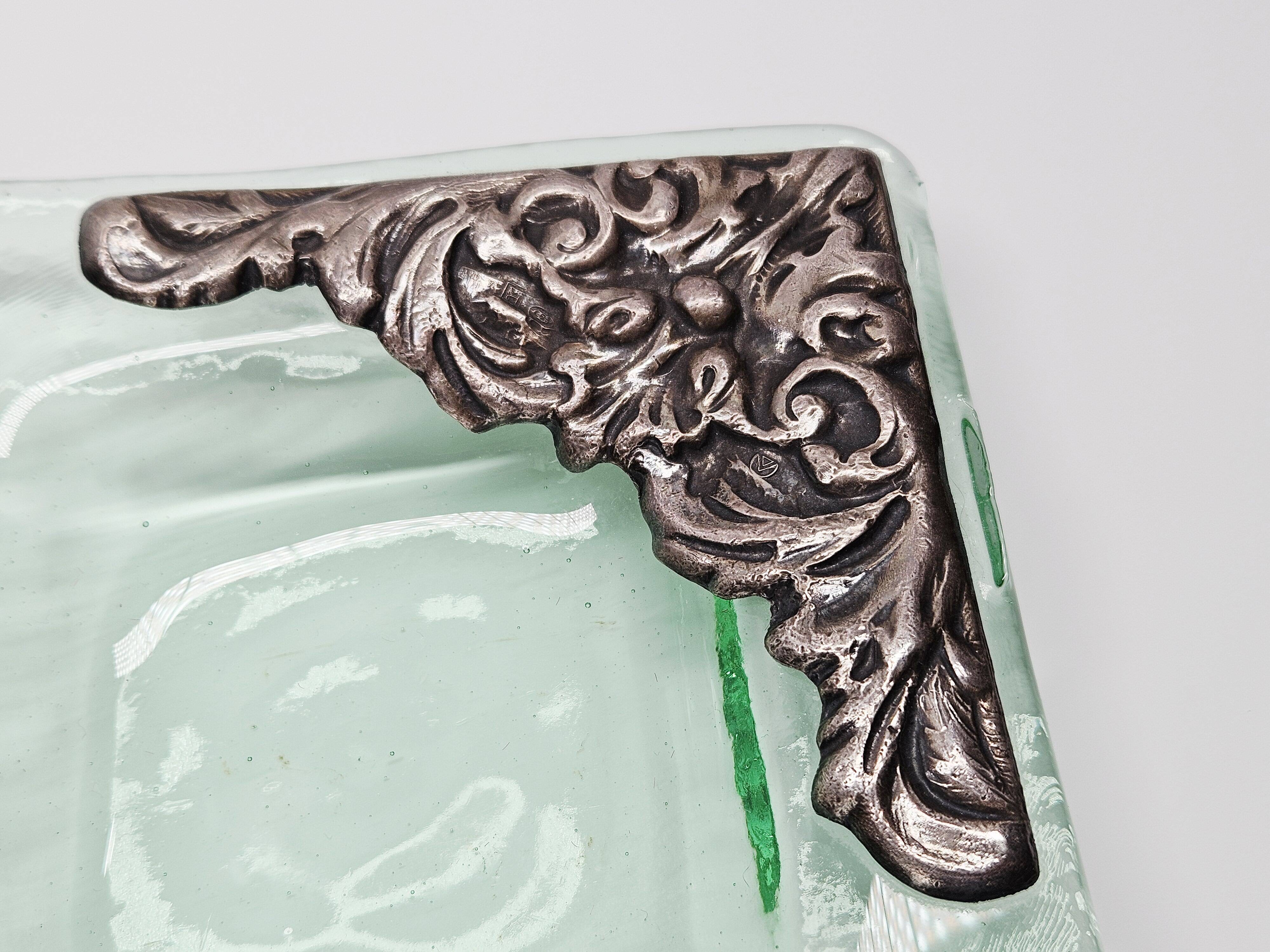 Murano glass catchall, corner adorned with baroque patterns.