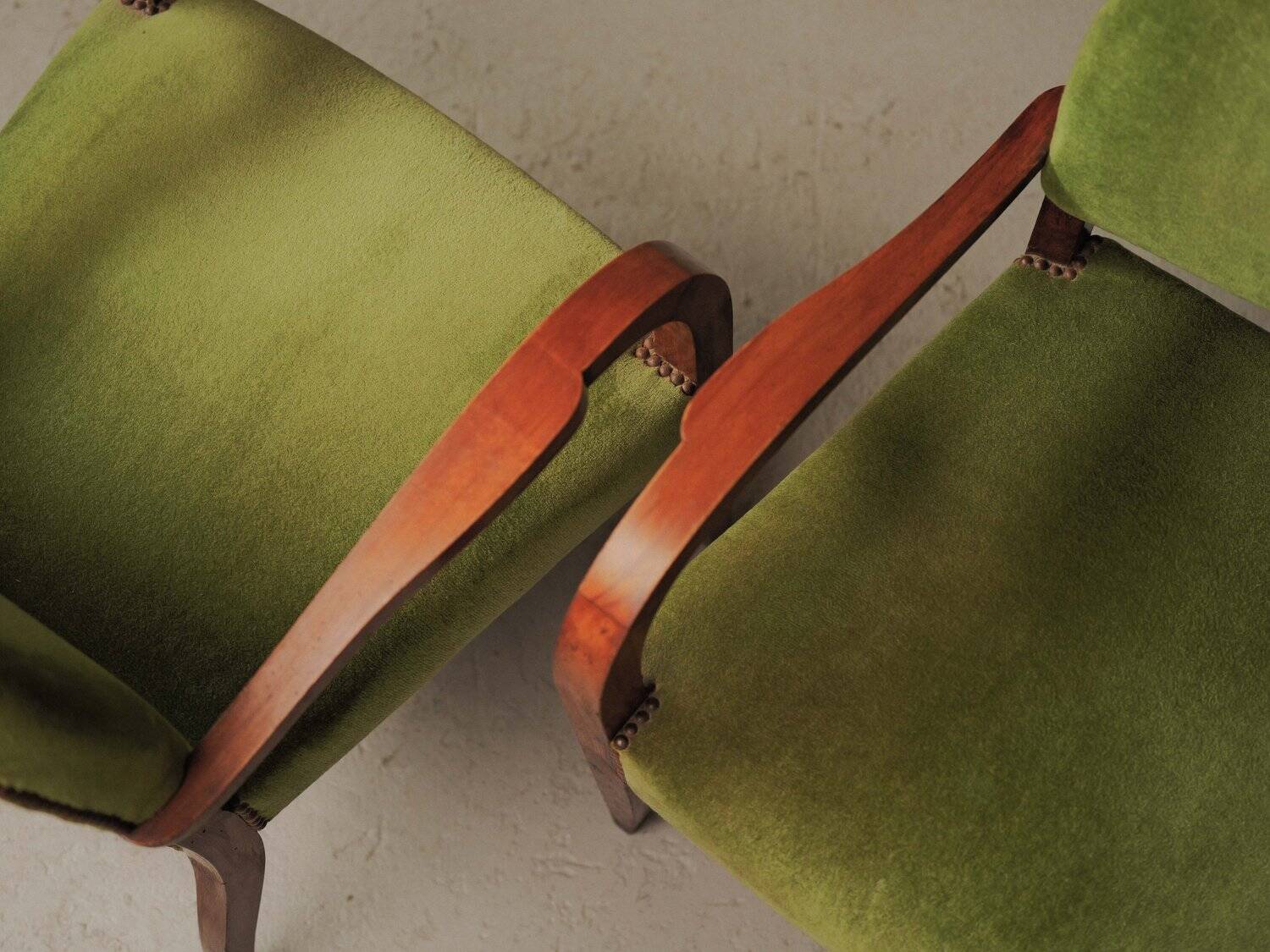 Pair of Art Deco armchairs in mahogany, circa 1930.