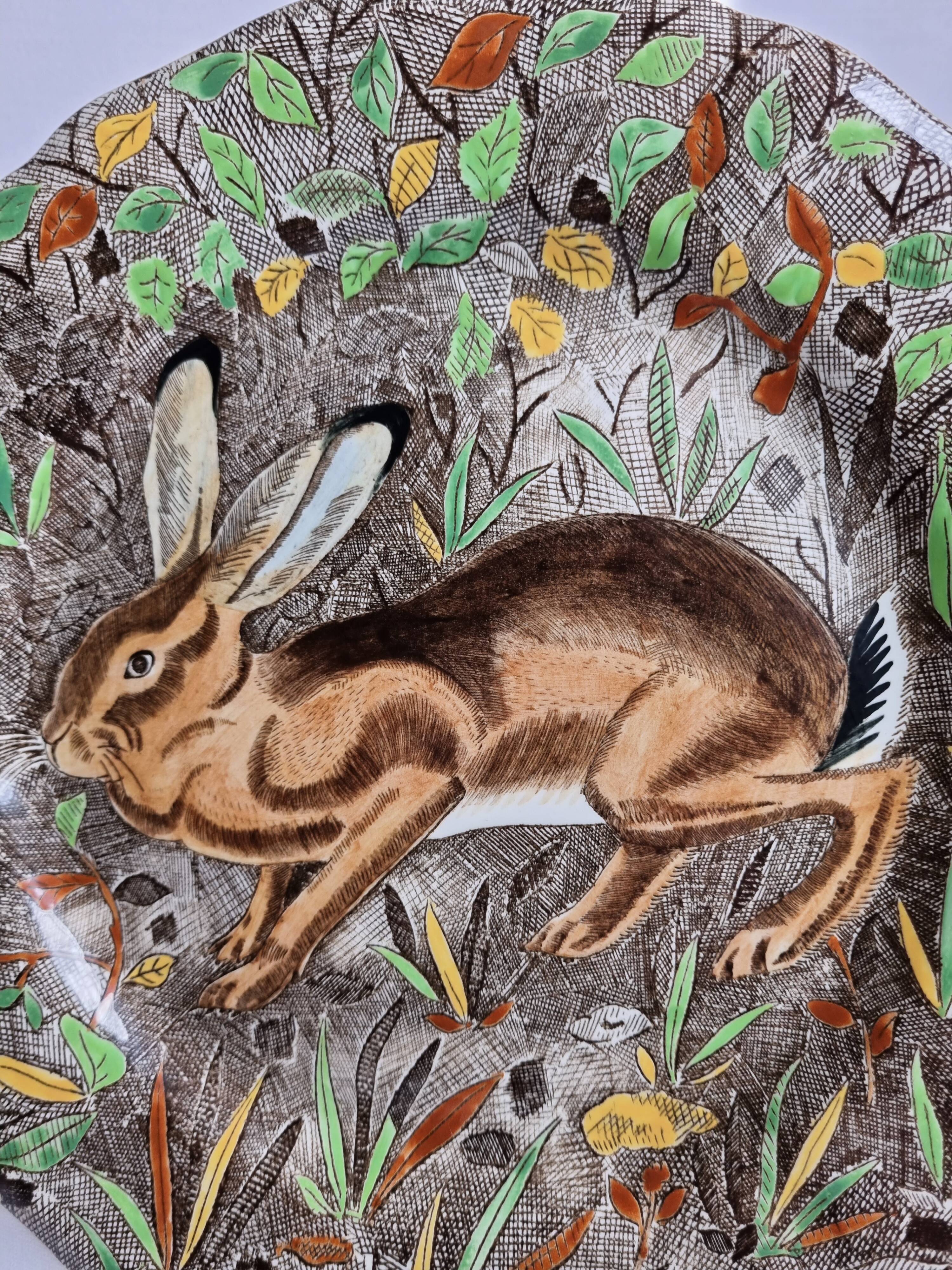 Plate in Gien earthenware, Rambouillet model, "hare" signed JB in the décor