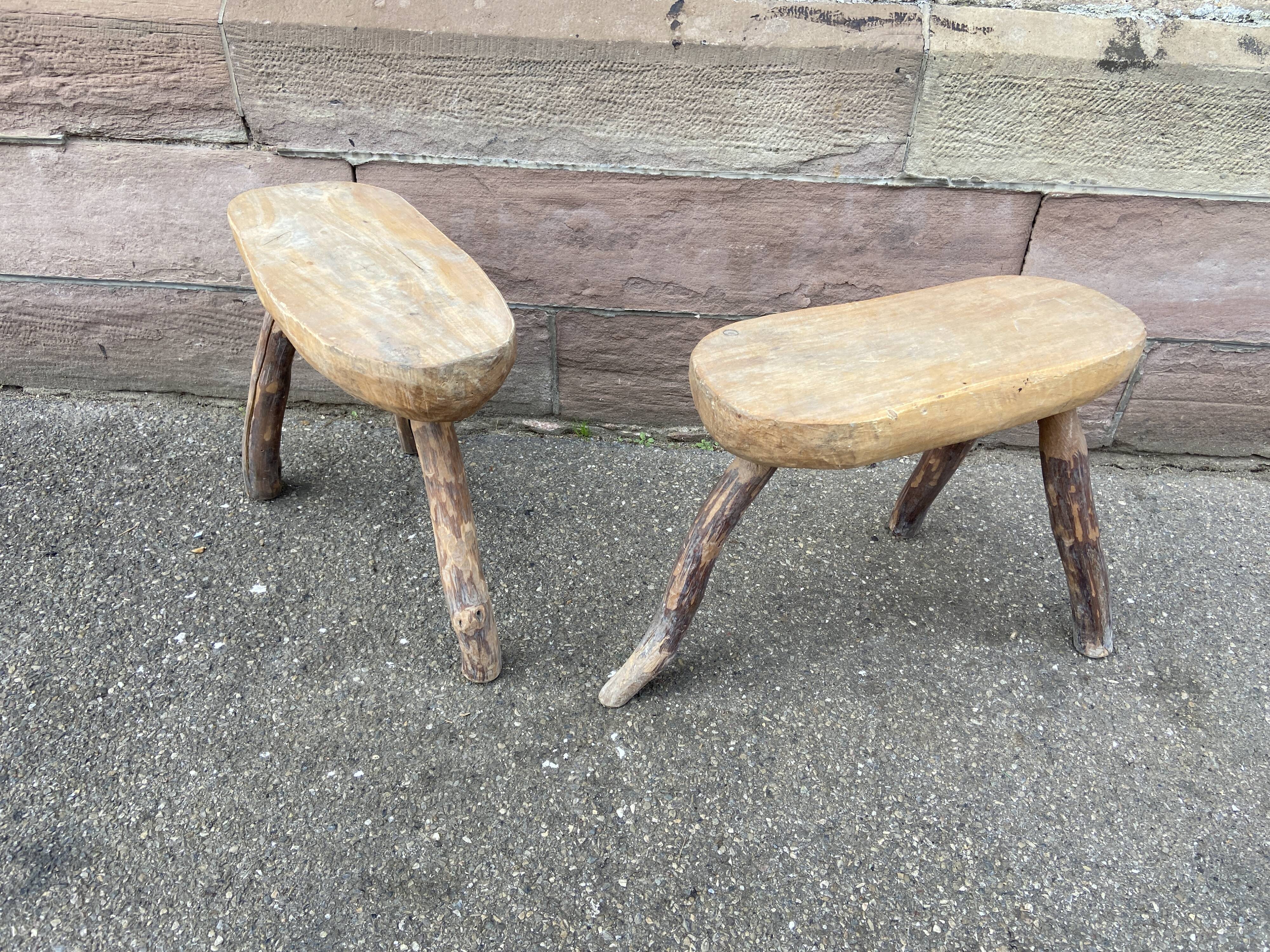 Pair of rustic 1940 brutalist wooden tripod farm stools vintage