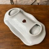 Plain white porcelain asparagus dish