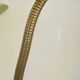 Flexible brass shell lamp