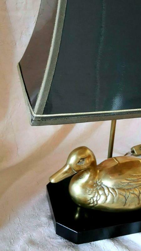 Lamp with brass duck on lacquered wood base
