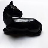 Black marble bookends with lying horses
