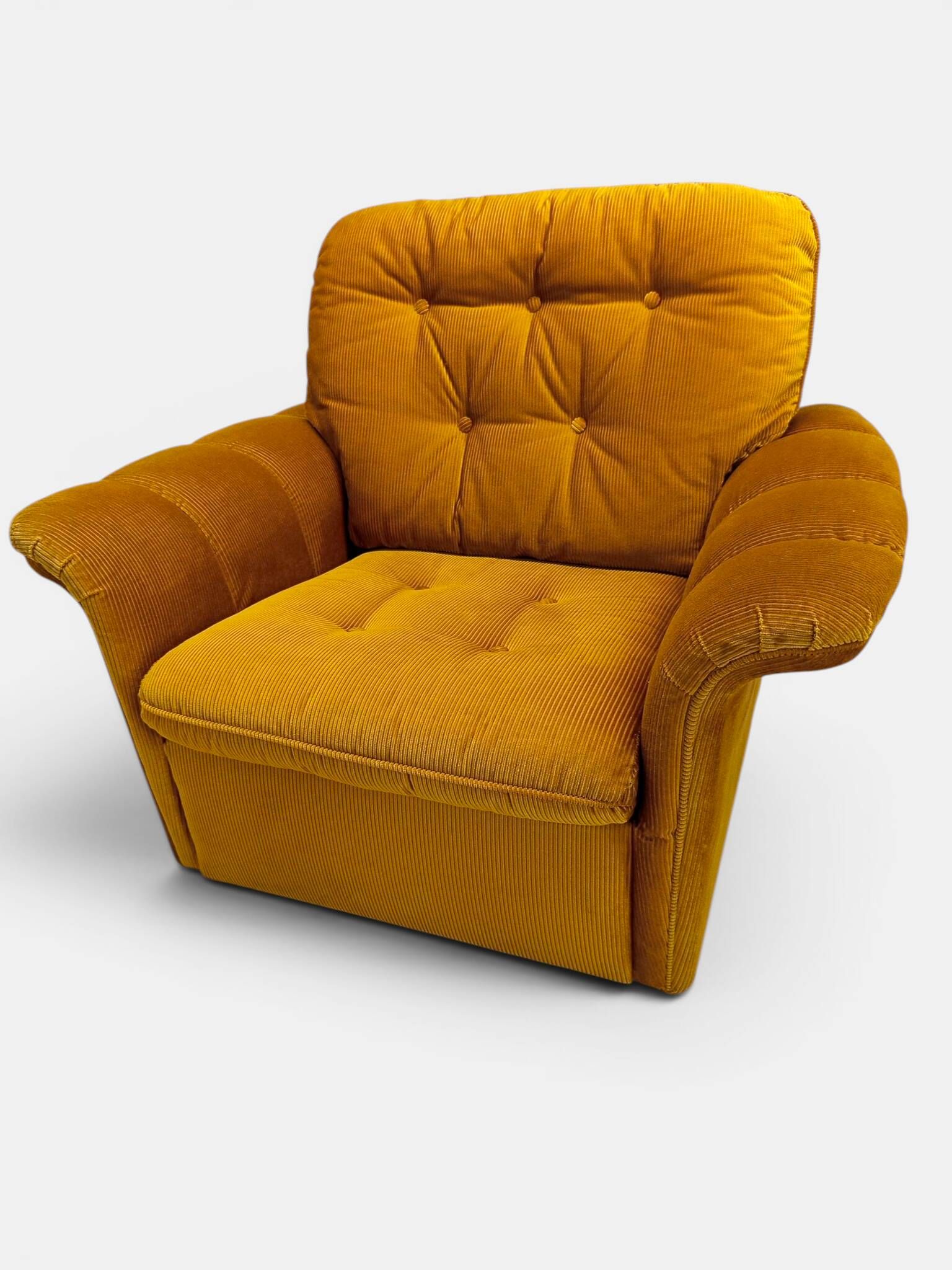 Vintage lounge chair on wheels in golden mustard corduroy 70s